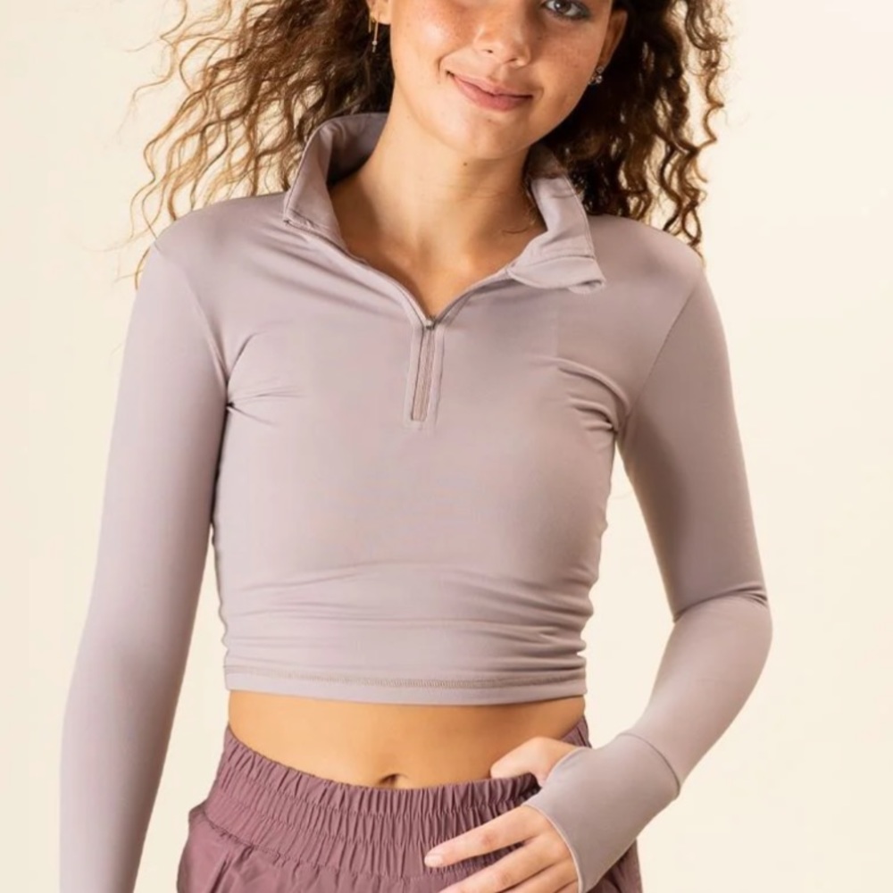 Paragon Fitwear Sedona 1/4 Zip Crop in color Faded Petal. Size Small. Never Worn